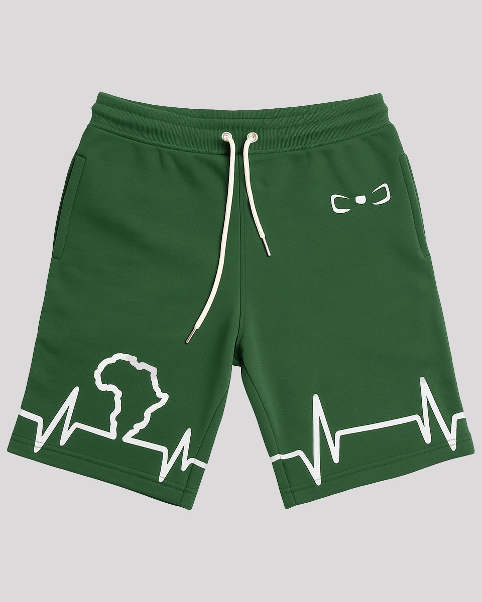 Green African Heartbeat Cotton Shorts by Gunner Doyle